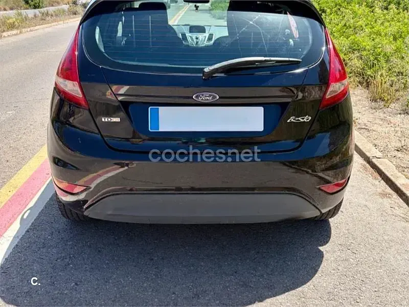 Usado Ford Fiesta Trend 90 CV (66 kW) 2010 Negro Berlina