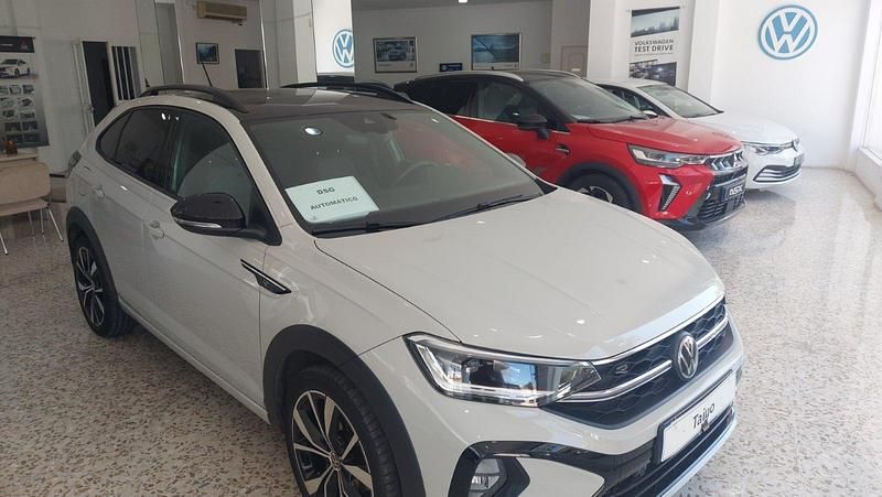 Usado VW Taigo R-line 110 CV (80 kW) 2022 Beig techo negro SUV