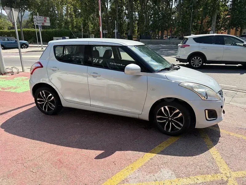 Usado Suzuki Swift GLX 94 CV (69 kW) 2015 Gris / plata Utilitario