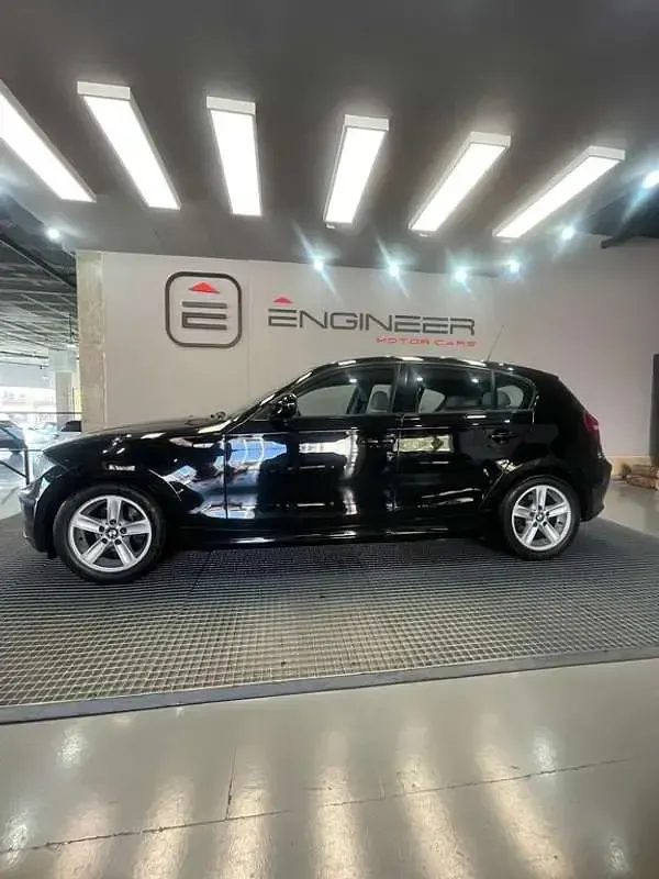 Usado BMW 116 116 CV (85 kW) 2009 Negro Utilitario