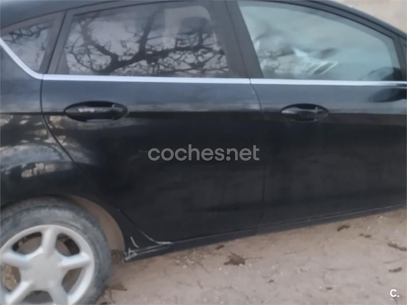 Negro Usado 2009 Ford Fiesta Titanium Berlina | 6500 € (Precio justo) - Imagen 1/2