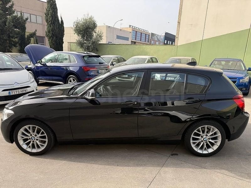 Usado BMW 118 Sport Line 170 CV (125 kW) 2012 Negro Utilitario