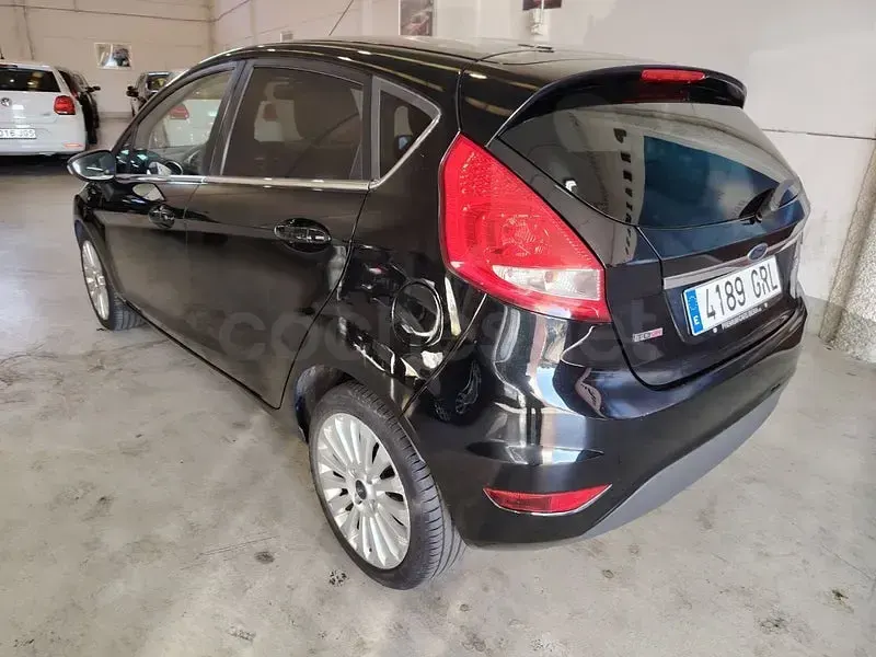 Usado Ford Fiesta Titanium 90 CV (66 kW) 2009 Negro Berlina