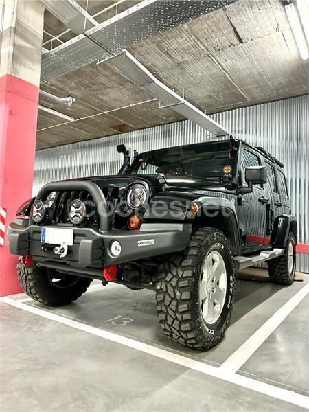 Negro Usado 2012 Jeep Wrangler Unlimited Sahara SUV | 39.900 € - Imagen 1/4