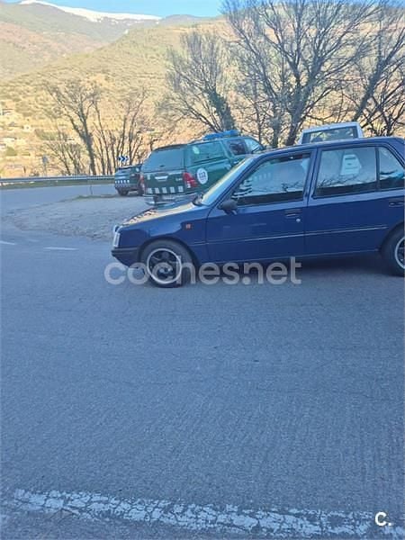 Usado Peugeot 205 60 CV (44 kW) 1997 Azul Utilitario