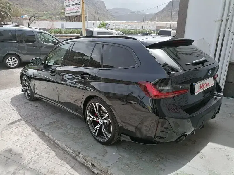 Usado BMW 320e 204 CV (150 kW) 2023 Negro Familiar