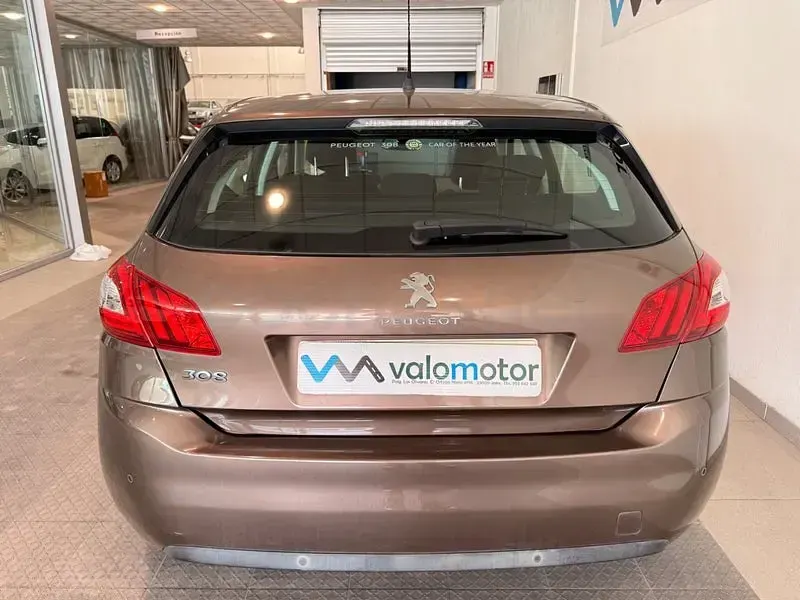Usado Peugeot 308 Allure 115 CV (84 kW) 2014 Marrón Berlina