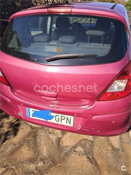 Usado Opel Corsa Cosmo 90 CV (66 kW) 2009 Granate Utilitario