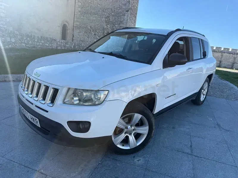 Usado Jeep Compass Sport 136 CV (100 kW) 2013 Blanco SUV