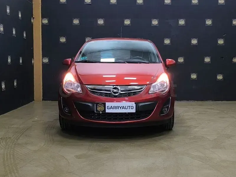 Usado Opel Corsa Selective 85 CV (62 kW) 2013 Granate Utilitario