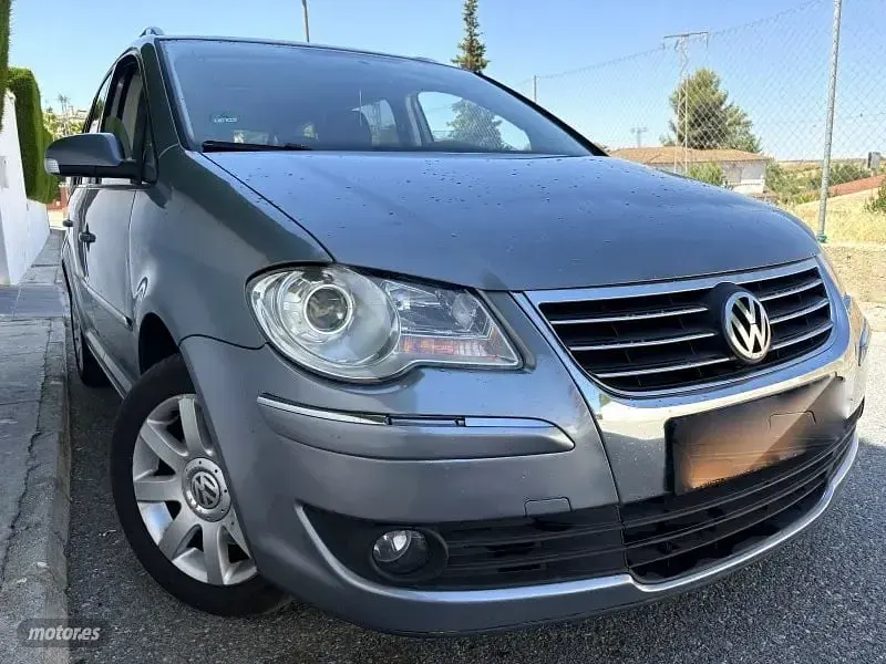 Usado VW Touran Highline 170 CV (125 kW) 2009 Azul Monovolumen