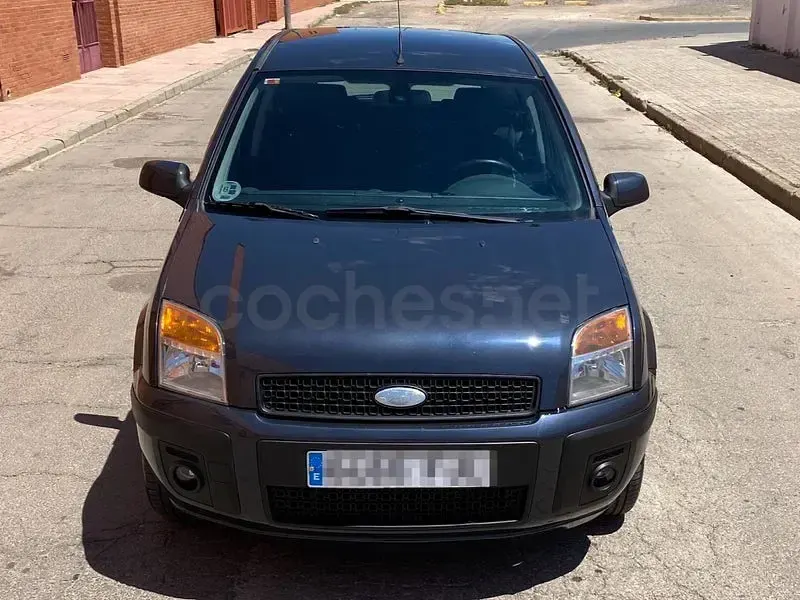 Usado Ford Fusion 68 CV (50 kW) 2006 Gris / plata Utilitario