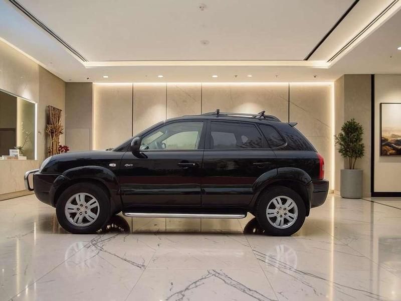 Käytetty Hyundai Tucson Comfort 140 HP (102 kW) 2006 Musta Katumaasturi
