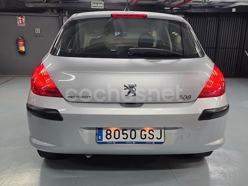 Usado Peugeot 308 90 CV (66 kW) 2010 Gris / plata Berlina