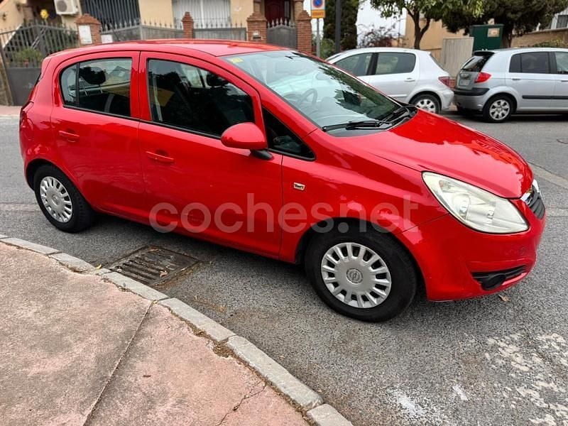 Usado Opel Corsa Essentia 80 CV (58 kW) 2009 Rojo Berlina