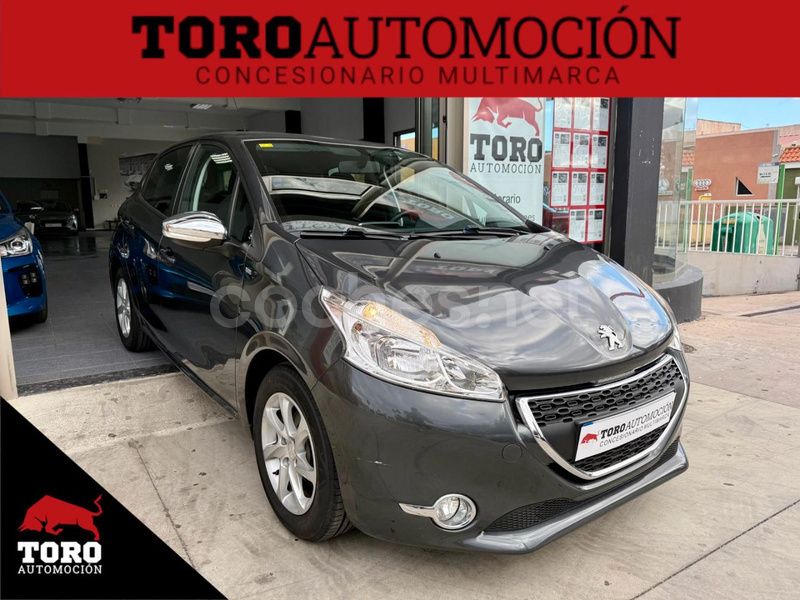 Marrón Usado 2015 Peugeot 208 Active Utilitario | 6490 € (Precio justo) - Imagen 1/4