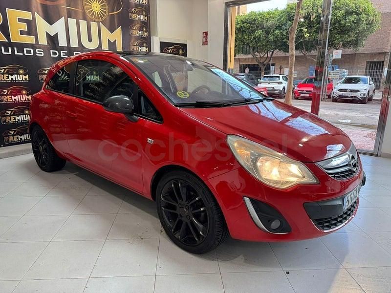 Usado Opel Corsa Selective 95 CV (69 kW) 2012 Rojo Utilitario