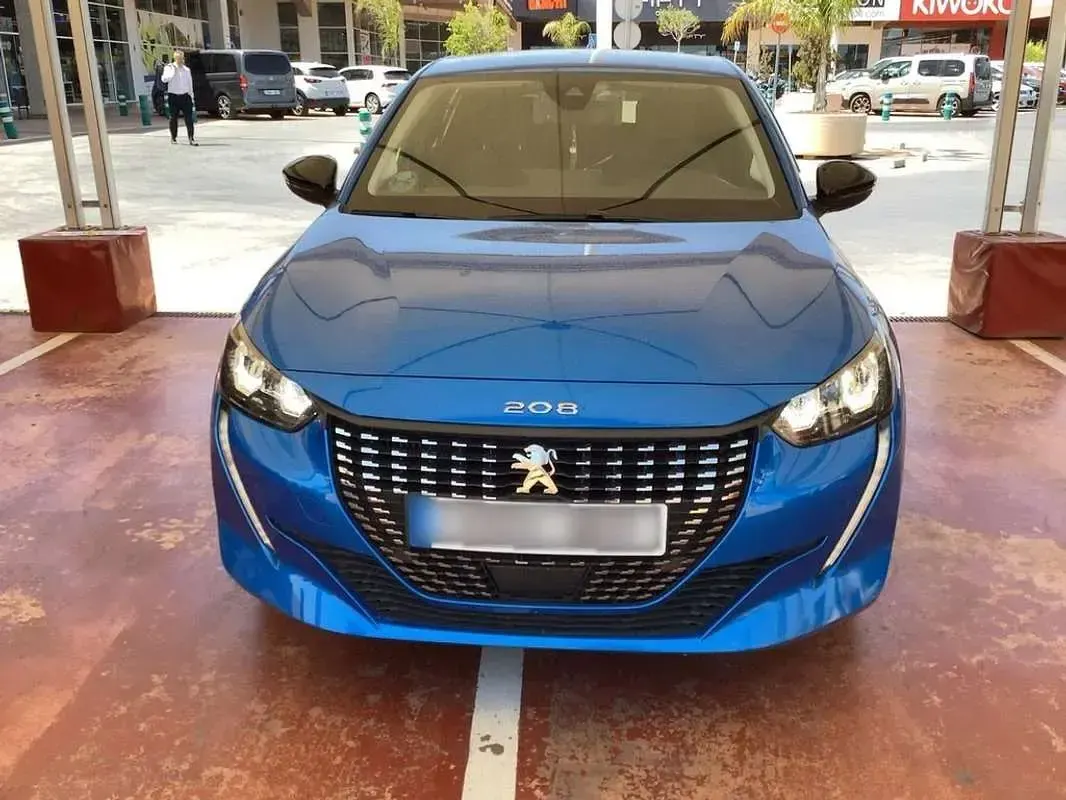 Usado Peugeot 208 Allure 99 CV (72 kW) 2023 Azul Utilitario