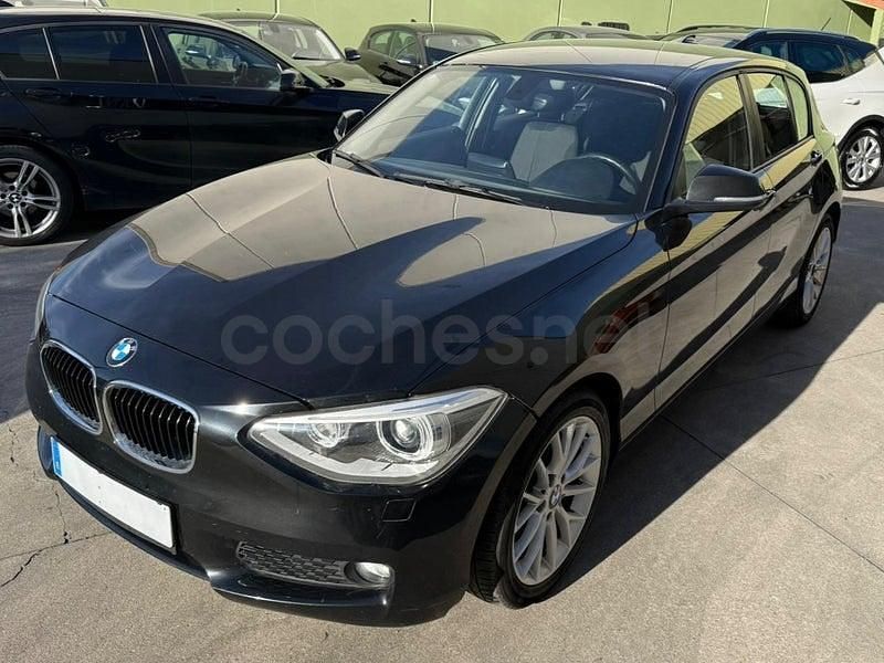 Usado BMW 118 Sport Line 170 CV (125 kW) 2012 Negro Utilitario