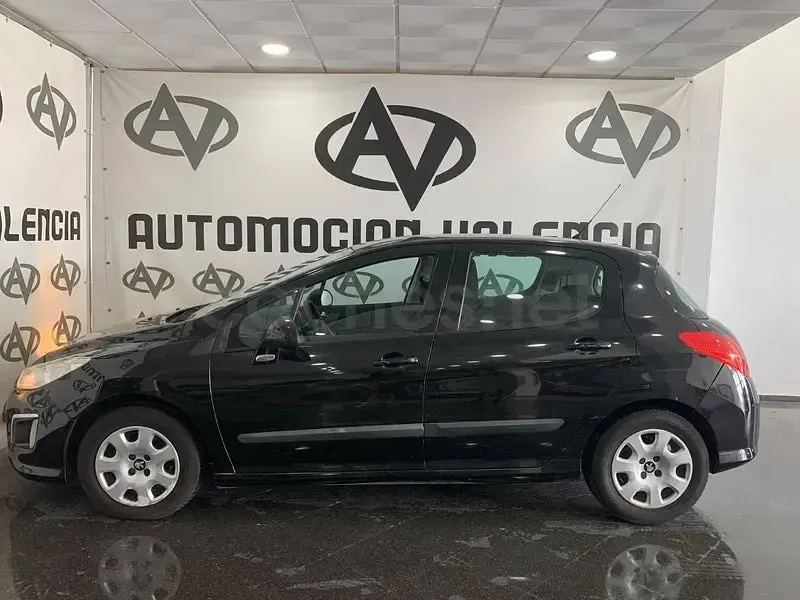 Usado Peugeot 308 Access 112 CV (82 kW) 2013 Negro Berlina