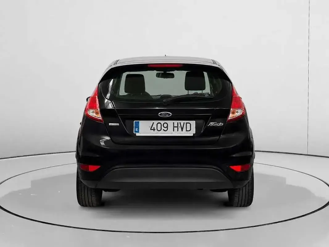 Usado Ford Fiesta Trend 101 CV (74 kW) 2013 Negro Utilitario