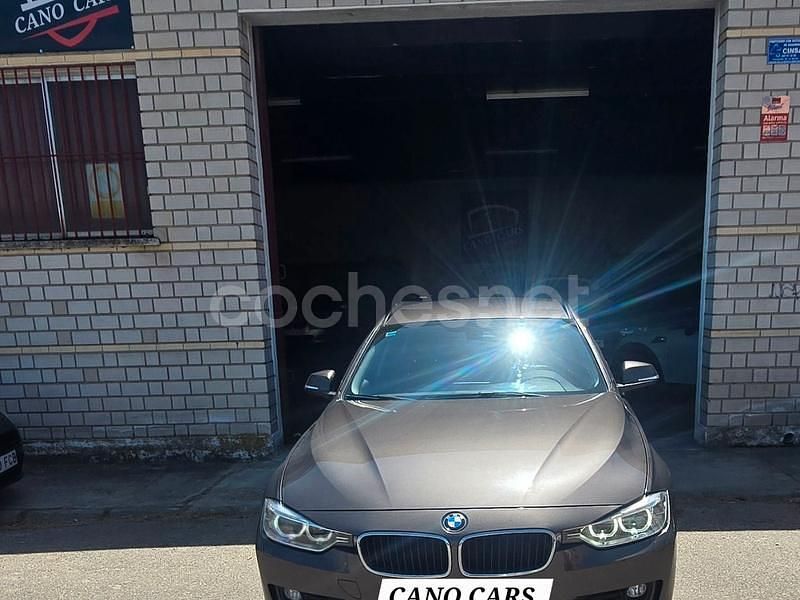 Marrón Usado 2014 BMW 318 Familiar | 8699 € (Precio justo) - Imagen 1/4