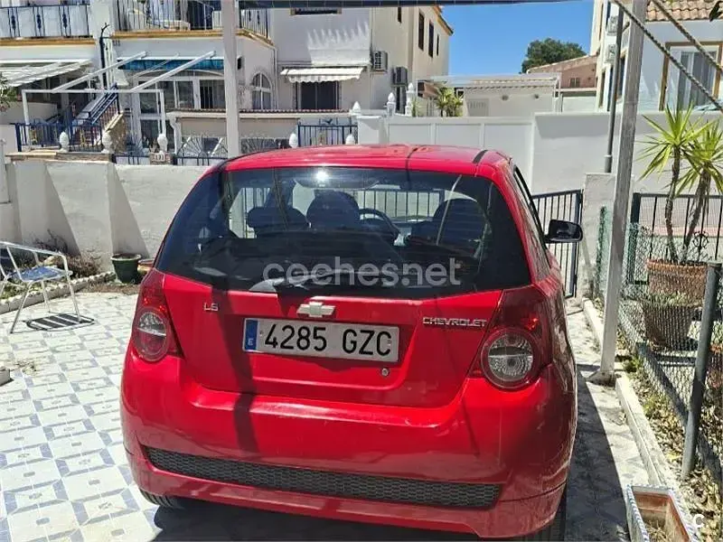 Usado Chevrolet Aveo LS 101 CV (74 kW) 2010 Rojo Berlina