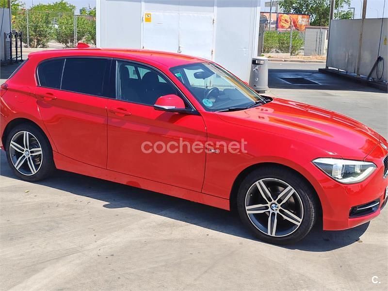 Usado BMW 116 Sport Line 136 CV (100 kW) 2012 Rojo Utilitario