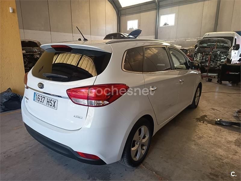 Używany Kia Carens 136 KM (100 kW) 2013 Biały Minivan