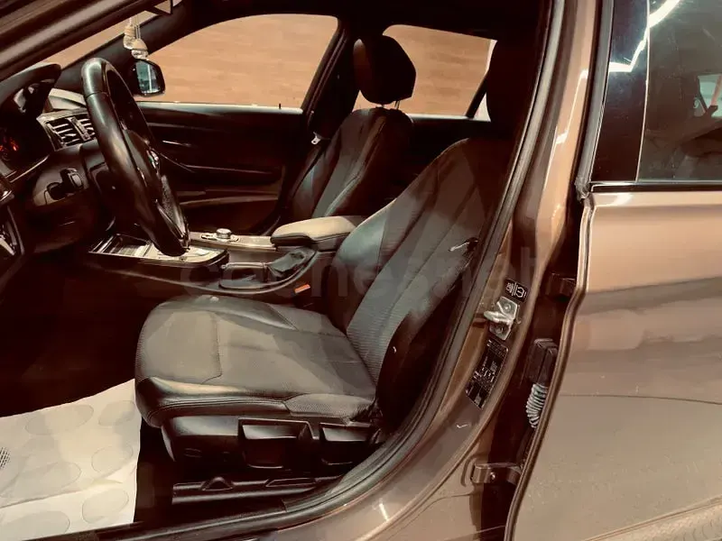Usado BMW 320 Sport Line 184 CV (135 kW) 2014 Marrón Familiar