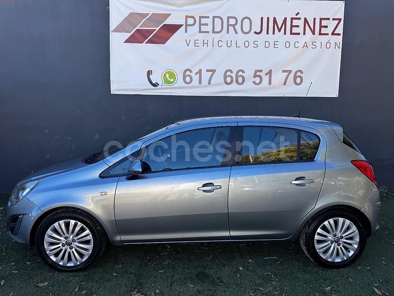 Gris / plata Usado 2013 Opel Corsa Selective Berlina | 4990 € (Buen precio) - Imagen 1/4