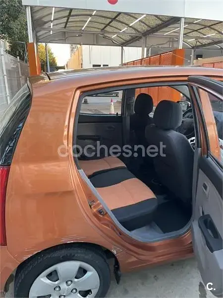 Usado Kia Picanto LX 61 CV (44 kW) 2007 Naranja Utilitario
