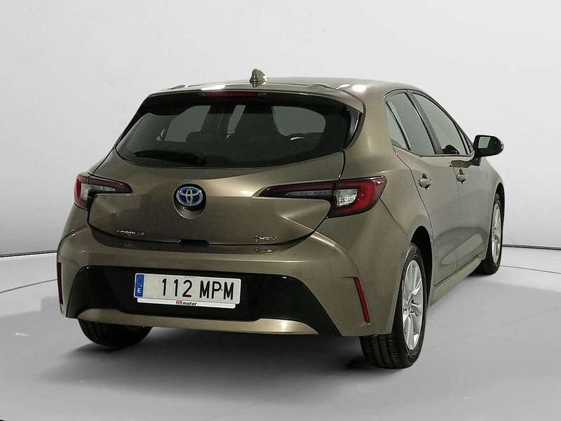 Usado Toyota Corolla Hybrid Active 141 CV (103 kW) 2024 Blanco Utilitario