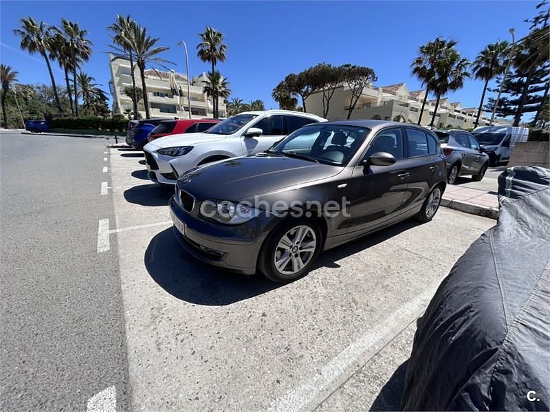 Usado BMW 118 129 CV (94 kW) 2007 Marrón Utilitario