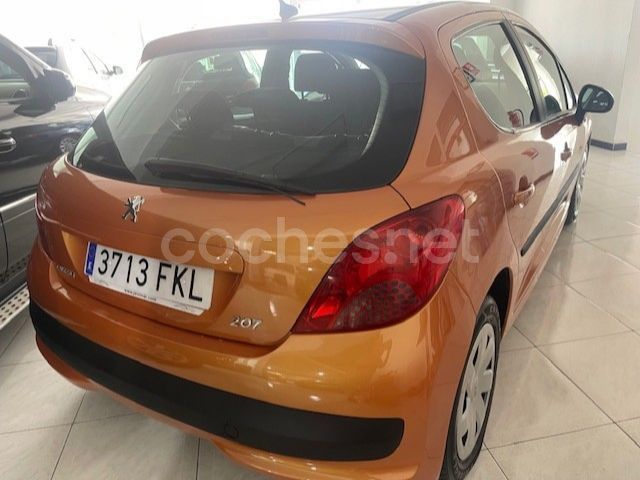 Usado Peugeot 207 70 CV (51 kW) 2007 Naranja Berlina