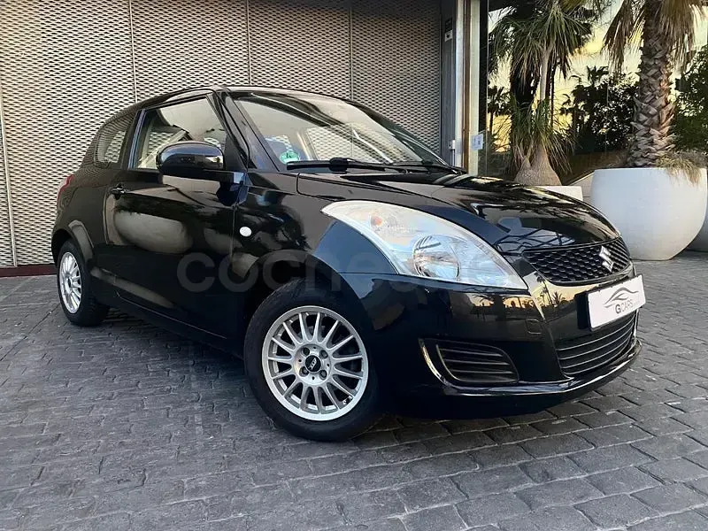 Usado Suzuki Swift GL 95 CV (69 kW) 2011 Negro Utilitario