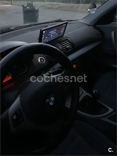 Usado BMW 118 122 CV (89 kW) 2007 Negro Utilitario