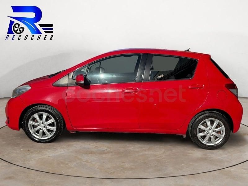 Usado Toyota Yaris City 90 CV (66 kW) 2012 Granate Utilitario
