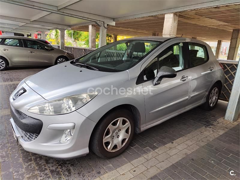 Usado Peugeot 308 90 CV (66 kW) 2010 Gris / plata Berlina