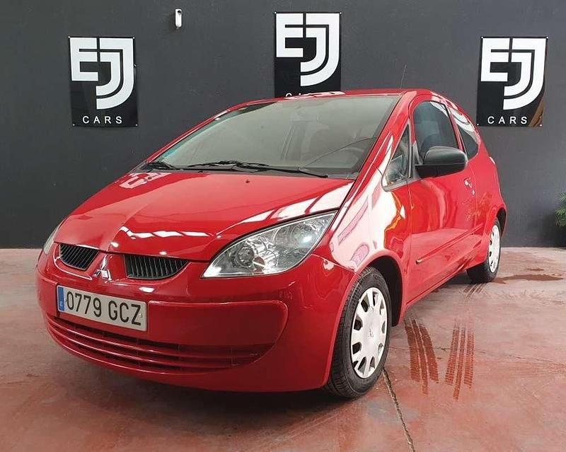 Usado Mitsubishi Colt Inform 75 CV (55 kW) 2008 Rojo Utilitario
