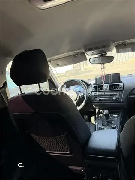 Usado BMW 116 122 CV (89 kW) 2012 Negro Utilitario