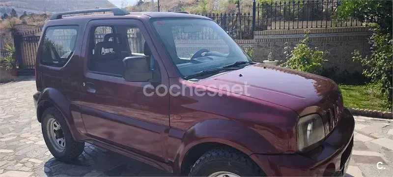 Usado Suzuki Jimny 80 CV (58 kW) 1999 Granate SUV