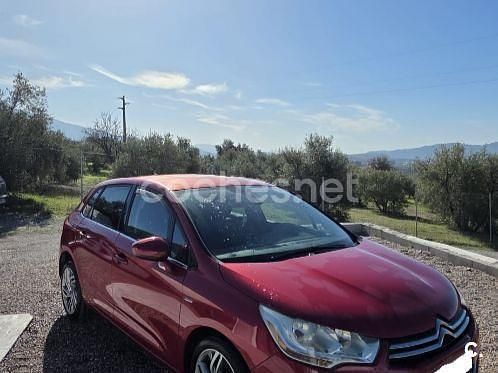 Usado Citroën C4 114 CV (83 kW) 2013 Granate Berlina