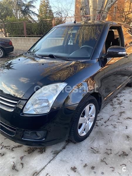Usado Suzuki Swift GLX 92 CV (67 kW) 2010 Negro Utilitario