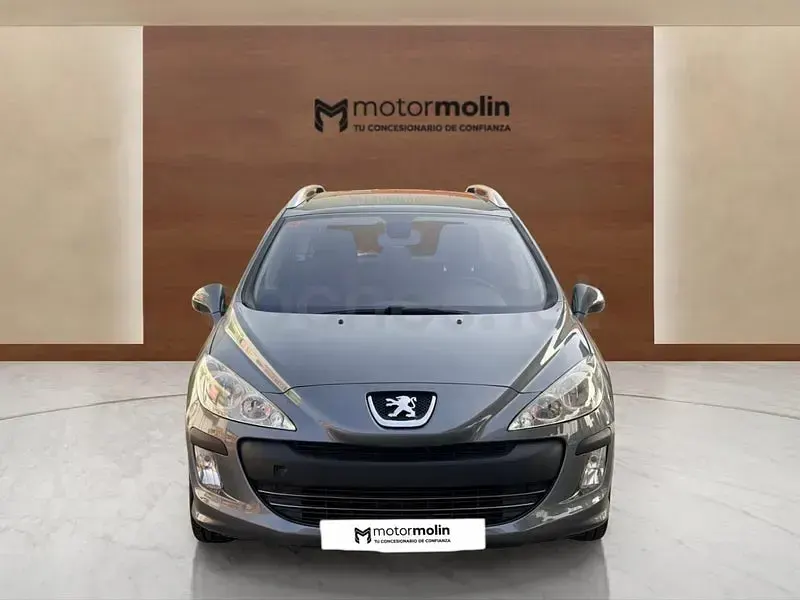 Usado Peugeot 308 SW 90 CV (66 kW) 2010 Gris / plata Familiar