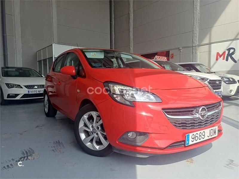Usado Opel Corsa Expression 75 HP (55 kW) 2015 Vermelho Sedan