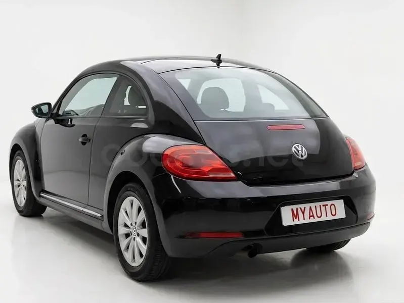 Usado VW Beetle Design 105 CV (77 kW) 2012 Negro Utilitario