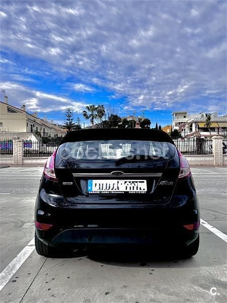 Usado Ford Fiesta Titanium 95 CV (69 kW) 2013 Negro Berlina