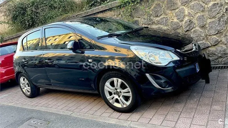 Usado Opel Corsa Expression 75 CV (55 kW) 2013 Negro Utilitario