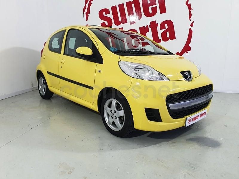 Usado Peugeot 107 68 CV (50 kW) 2010 Amarillo Utilitario